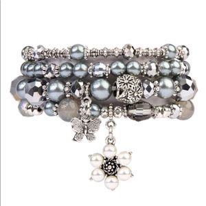 Butterfly multi bead stretch charm bracelet
